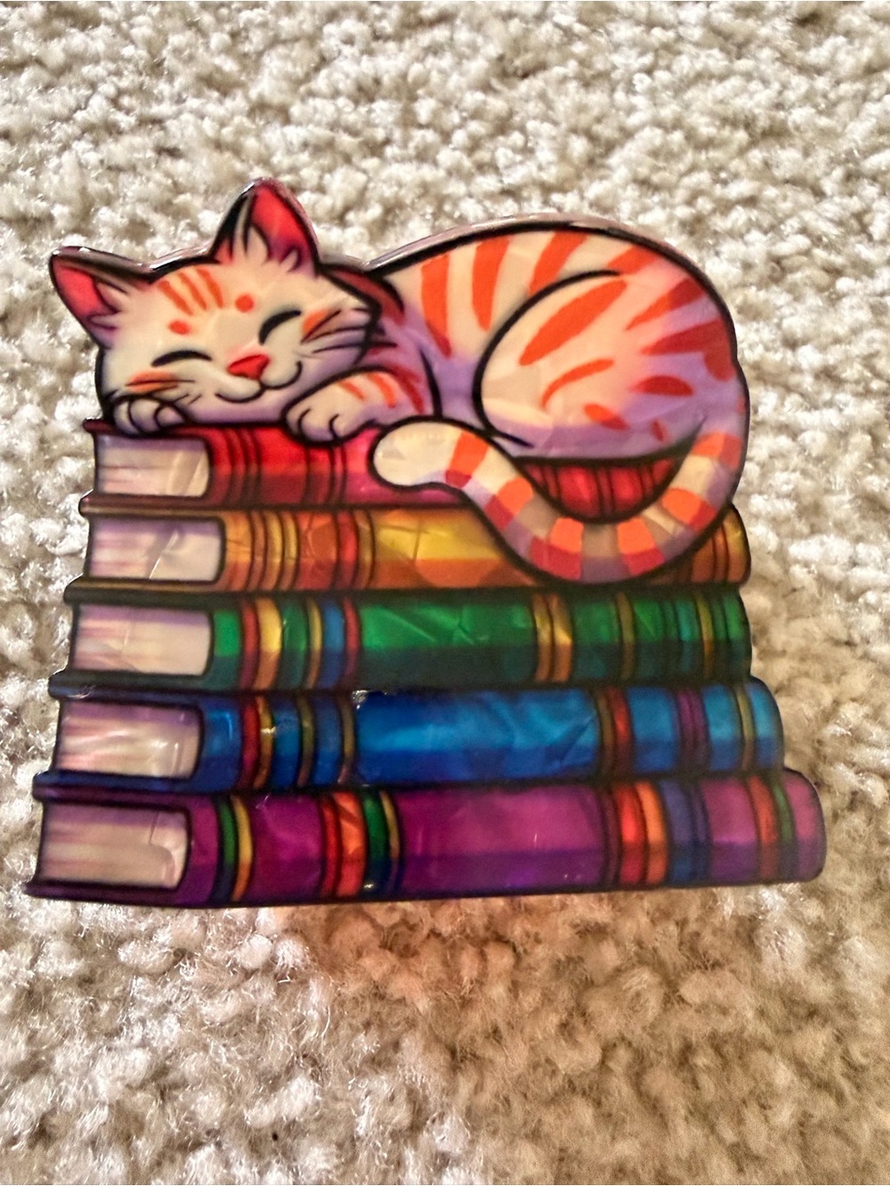 Orange Tabby Cat on Colorful Books Pet Sticker